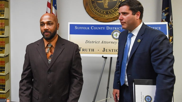 Keith Bush with Suffolk County District Attorney Timothy Sini at...