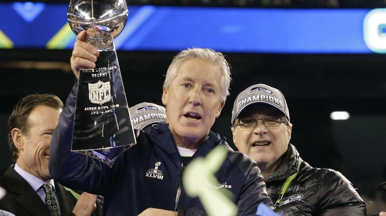 Seattle Seahawks head coach Pete Carroll celebrates with the Vince...