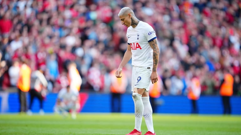 Tottenham's Richarlison reacts in disappointment at the end of the...