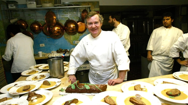 2003: Guy Reuge cooking a traditional French Noel dinner at...