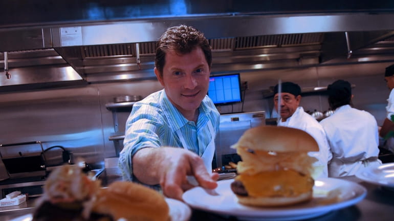 Chef Bobby Flay at his burger joint, Bobby's Burger Palace,...