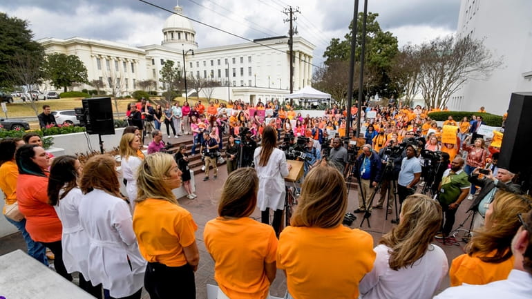 Hundreds gather for a protest rally for in vitro fertilization...