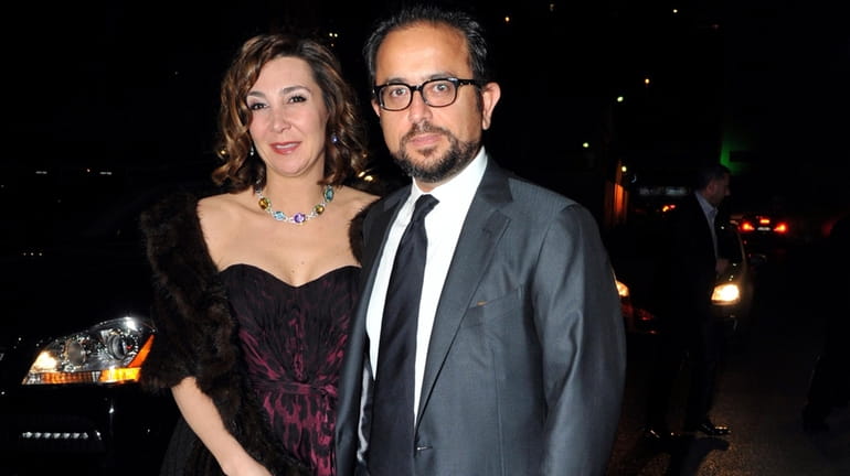 Ali Sabanci, and his wife Vuslat Dogan Sabanci, are seen...