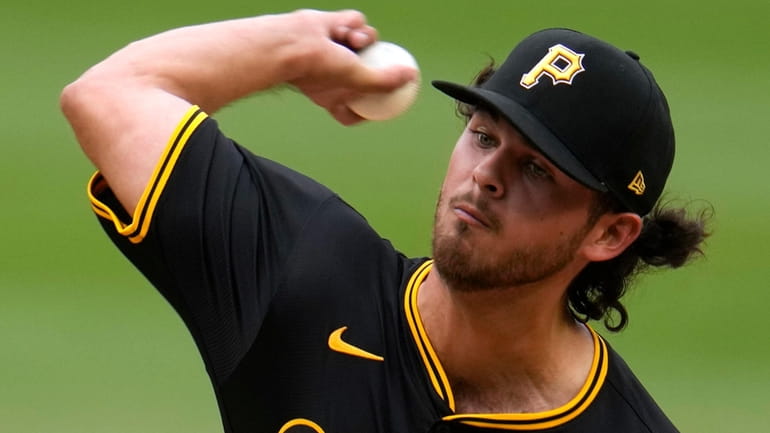 Pittsburgh Pirates starting pitcher Jared Jones delivers during the first...