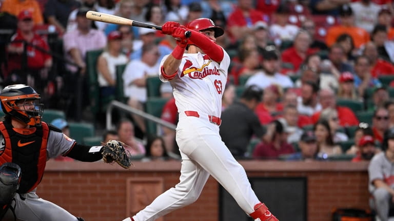 St. Louis Cardinals' Michael Siani watches his three-run home run...