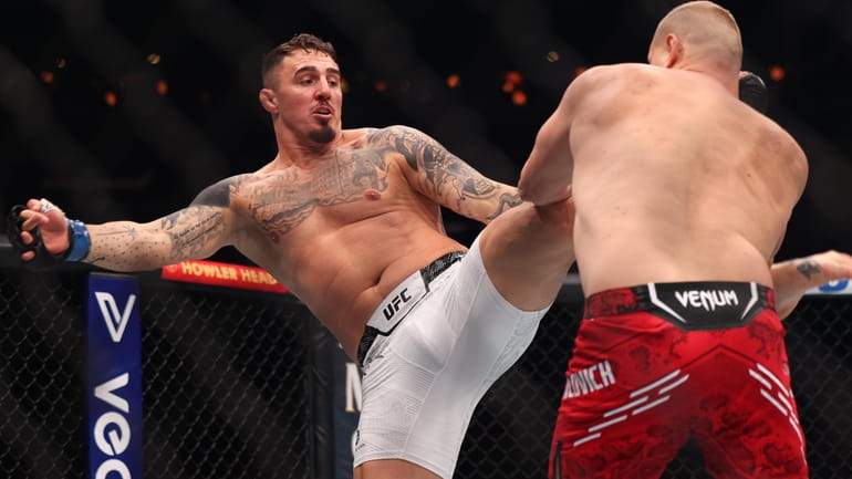 UFC: UFC 295: Alex Pereira crowned light heavyweight champ, Tom Aspinall  wins interim heavyweight title
