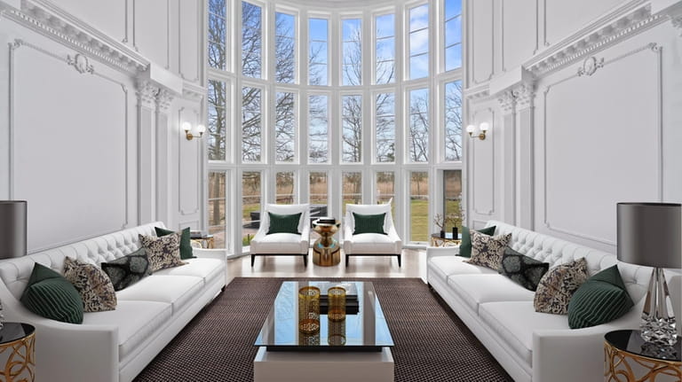 The formal living room sports a curved wall of windows.