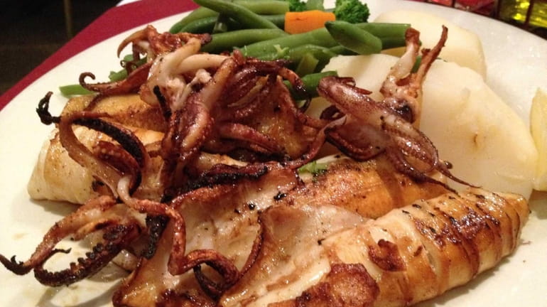 The grilled squid is a highlight at Ole, a Portuguese...