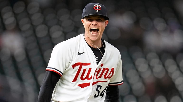 Twins starting pitcher Sonny Gray celebrates after striking out the Yankees'...