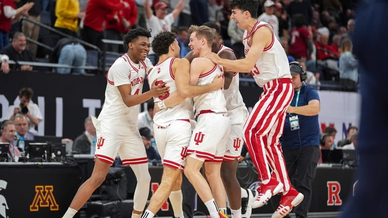 Indiana players celebrate after their win over Penn State in...
