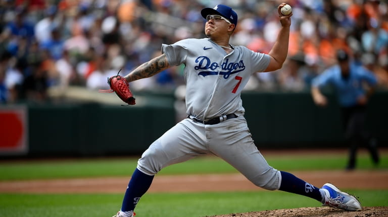Los Angeles Dodgers starting pitcher Julio Urias throws during the...