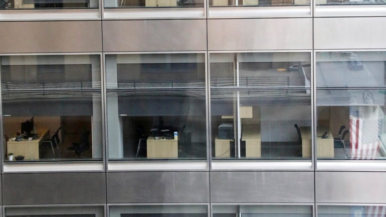 Office suites remain empty at a building on Sixth Avenue in midtown Manhattan....
