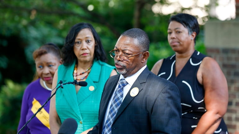 NAACP Virginia President Robert N. Barnette Jr. speaks near the...
