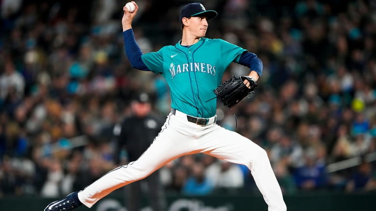 Seattle Mariners starting pitcher George Kirby throws against the Arizona...