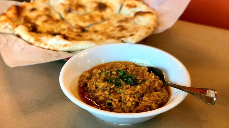 Urad dal with butter naan at Kolachi in Elmont.