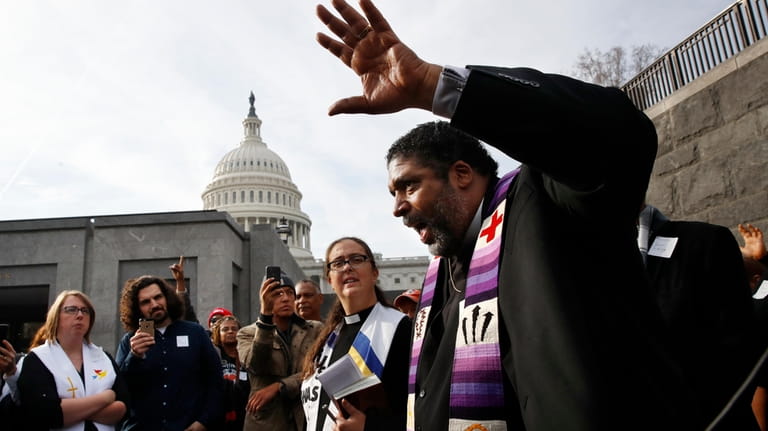 Rev. William Barber II, with the "Poor People's Campaign," speaks...