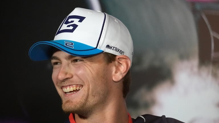 Williams driver Logan Sargeant, of the United States, smiles during...