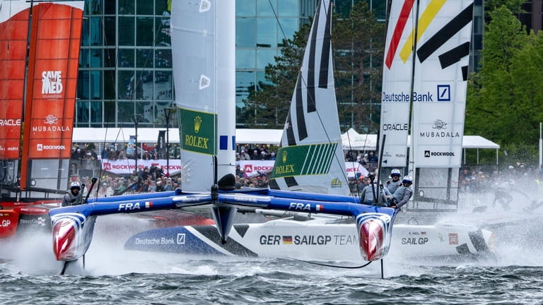France SailGP Team helmed by Quentin Delapierre sail away from...