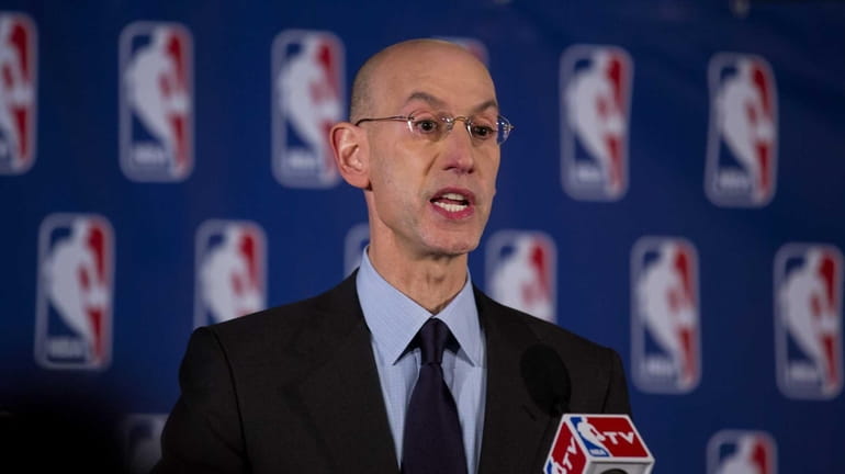 NBA Commissioner Adam Silver announces at a press conference Tuesday,...