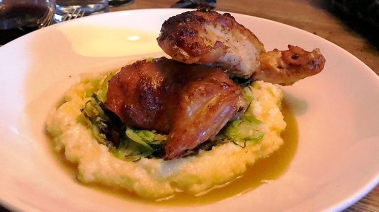 Publicans in Manhasset serves roast chicken and Brussels sprouts over...