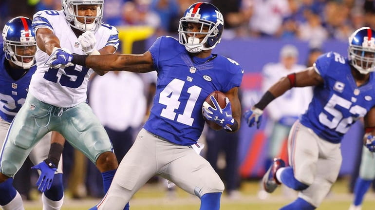 Giants' Dominique Rodgers-Cromartie looks for room to run after his...