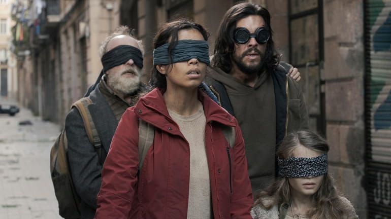 This image released by Netflix shows, from left, Gonzalo de...
