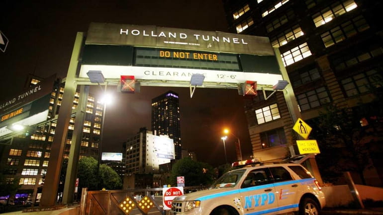 Police closed the entrance to the Holland Tunnel from Canal...