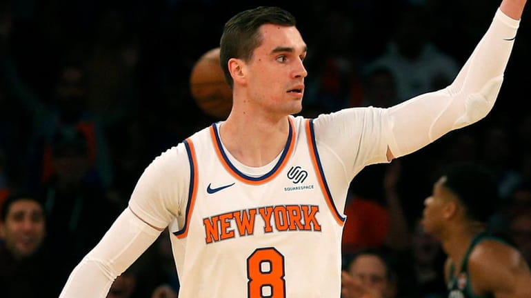 The Knicks' Mario Hezonja reacts after dunking against the Bucks during...