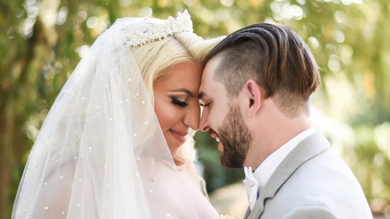 The couple share a special moment on their wedding day.
