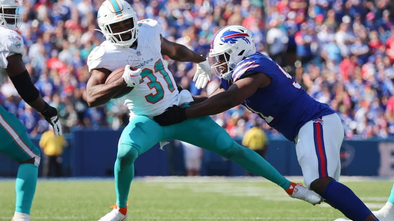 Josh Allen throws 4 TD passes, runs for score, Bills rout division rival  Dolphins 48-20 - Newsday
