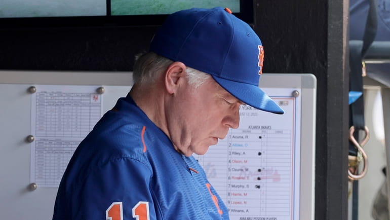 Manager Buck Showalter #11 of the New York Mets looks...