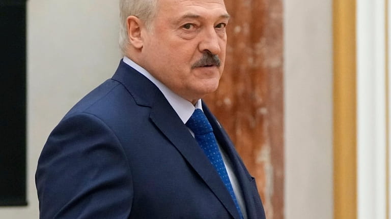 Belarusian President Alexander Lukashenko arrives to attend a meeting with...