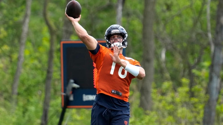 Chicago Bears quarterback Caleb Williams throws a pass during the...