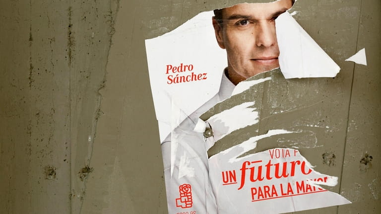 A poster of the leader of Socialist Party Pedro Sanchez...