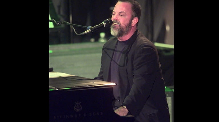  Billy Joel performs his song "Only the Good Die Young"...