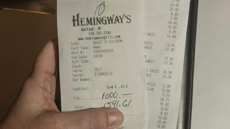 A regular customer at Hemingway's Bar and Grill in Wantagh,...