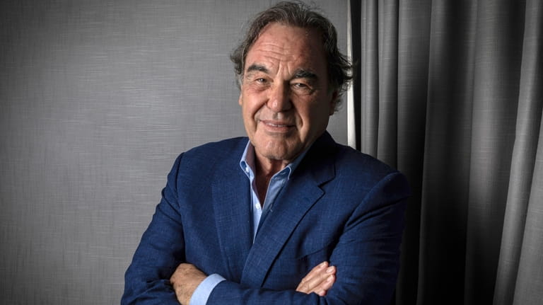 Oliver Stone poses for the film "JFK Revisited: Through the...