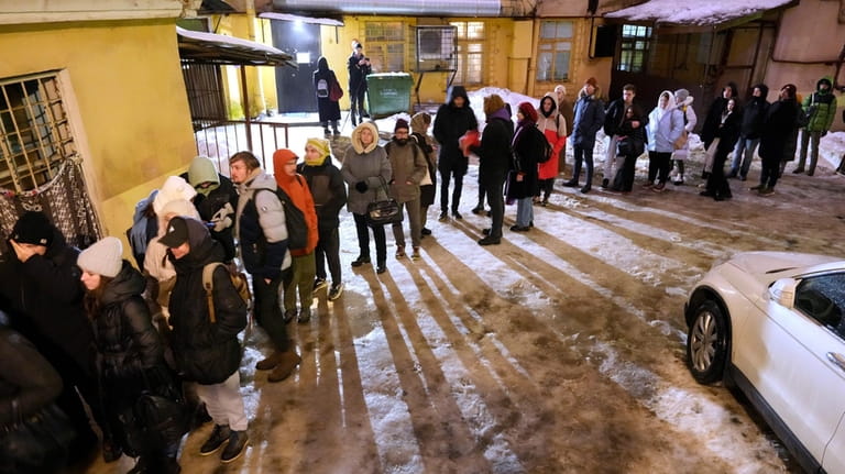 People line up in St. Petersburg, Russia, on Tuesday, Jan....
