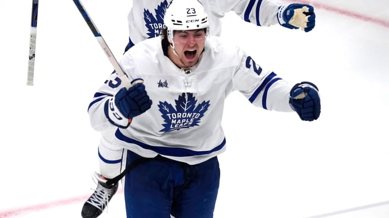 Toronto Maple Leafs left wing Matthew Knies (23) celebrates his...