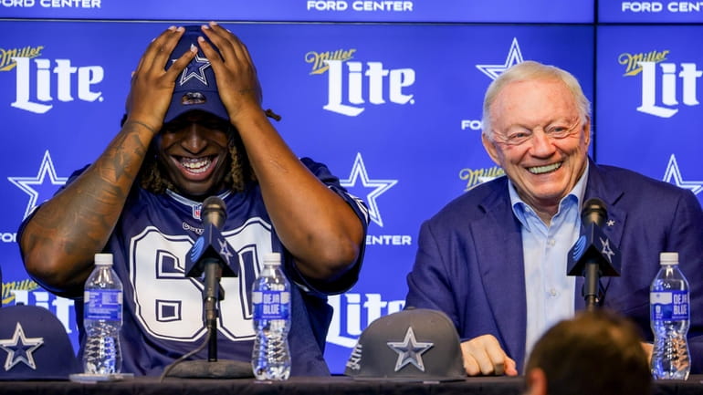 Dallas Cowboys owner Jerry Jones, right, speaks at an NFL...