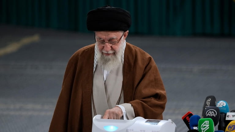 Iranian Supreme Leader Ayatollah Ali Khamenei votes for the parliamentary...