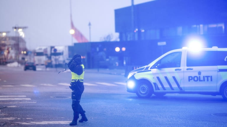 A police officer in the center of Bodø, Northern Norway,...