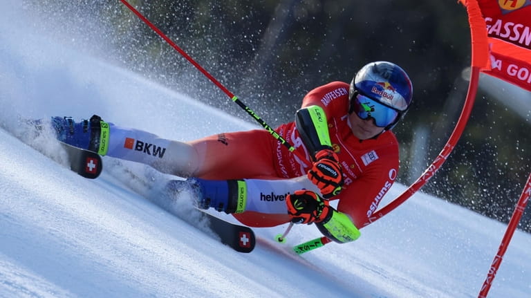 Switzerland's Marco Odermatt speeds down the course during an alpine...