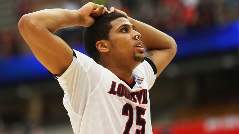 Wayne Blackshear #25 of the Louisville Cardinals reacts during the...