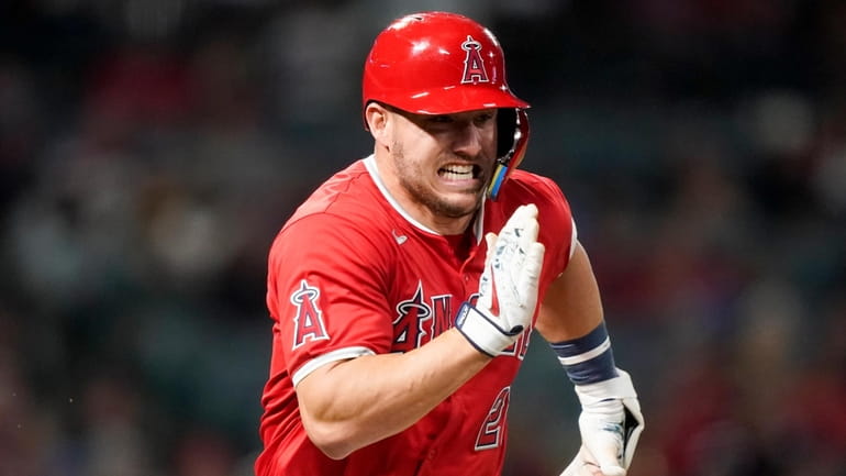 Los Angeles Angels' Mike Trout runs after a single during...