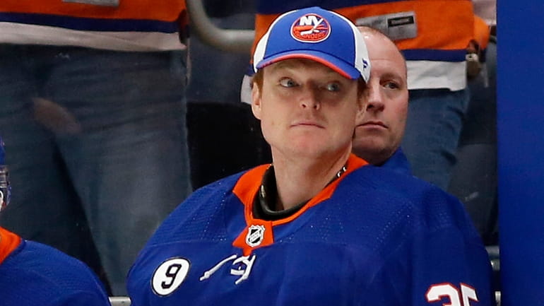 Cory Schneider of the Islanders looks on during the third period...