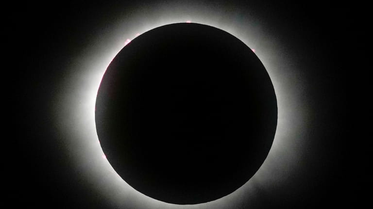 The moon covers the sun during a total solar eclipse...