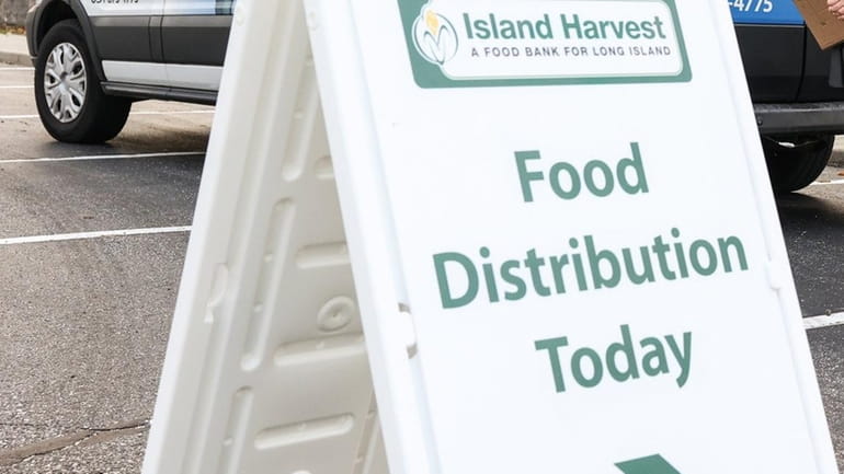 The Island Harvest Food bank in Melville is purchasing food...