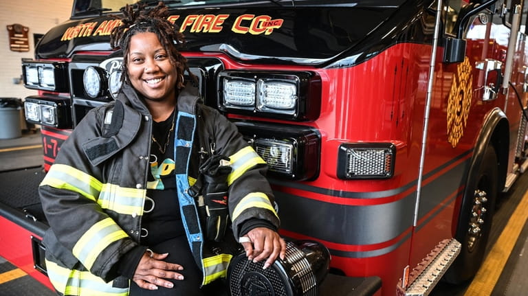 Rashada Delaney, the first female member of the North Amityville Fire...