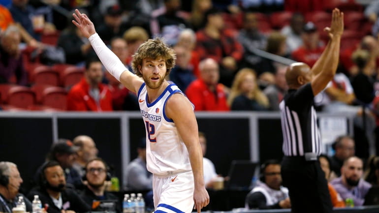 Boise State guard Max Rice (12) celebrates after a 3-point...